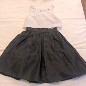 Girls back and white dress.